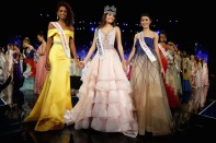 Winner of Miss World Miss Puerto Rico Stephanie Del Valle (C) stands with first runner up Miss Dominican Republic Yaritza Miguelina Reyes Ramirez (L) and second runner up Miss Indonesia Natasha Mannuela during the Miss World 2016 Competition in Oxen Hill, Maryland, U.S., December 18, 2016. REUTERS/Joshua Roberts